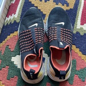 Nike sport shoes black and peach color